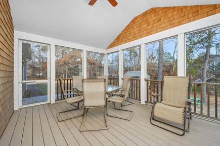 Eastham Cape Cod vacation rental - Screened-in back deck ideal for meals or relaxation