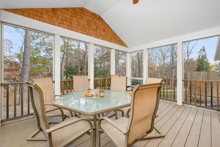 Eastham Cape Cod vacation rental - Screened-in back deck ideal for meals or relaxation