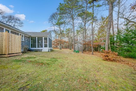 Eastham Cape Cod vacation rental - View of the backyard with a picnic table