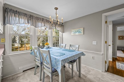 Harwich Port Cape Cod vacation rental - Dining area with seating for 4, with additional bench that allows 6