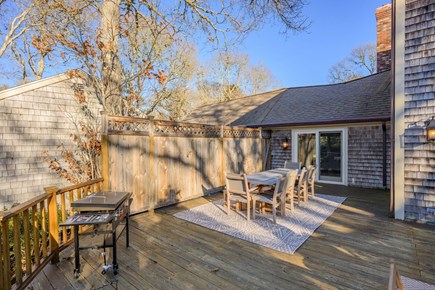 Harwich Cape Cod vacation rental - Deck offers outdoor dining table  and grill