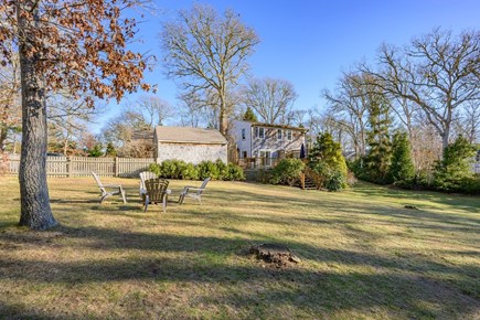 Harwich Cape Cod vacation rental - Fully fenced backyard  with firepit