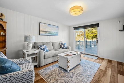 Bourne Cape Cod vacation rental - Sitting area off kitchen with sliders to the deck