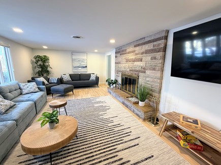 Hyannis Cape Cod vacation rental - Large living room with big screen TV and fireplace