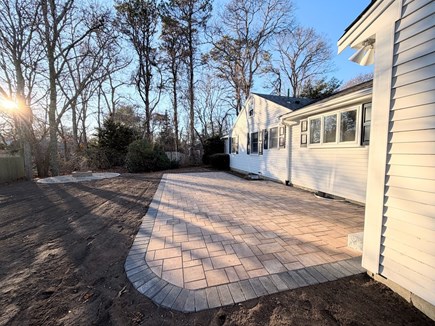 Hyannis Cape Cod vacation rental - Large back yard with fire pit.