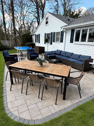 Hyannis Cape Cod vacation rental - Fully equipped backyard with outdoor couches, table and grill