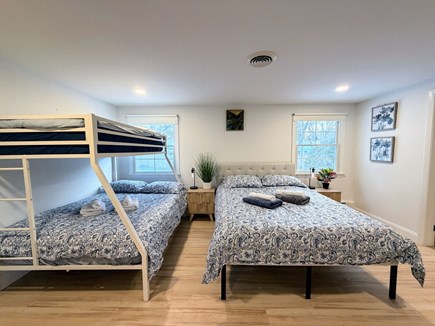 Hyannis Cape Cod vacation rental - Large master bedroom with queen bed and twin over full bunk