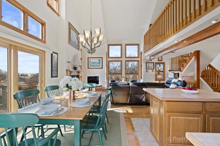 Brewster Cape Cod vacation rental - Dining area and kitchen, looking toward living room.