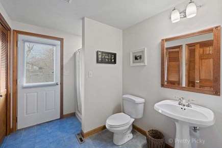 Brewster Cape Cod vacation rental - Full bath, main level.  There's a step-in shower right next to the  door, so you can rinse off sand and salt from the beach.Washer and dryer are also