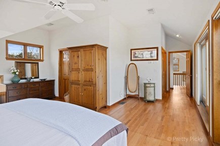 Brewster Cape Cod vacation rental - King bedroom again.. There's a TV in that armoire