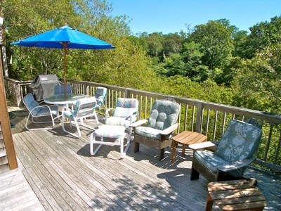 Brewster Cape Cod vacation rental - The deck has plenty of seating for outdoor dining and plenty of comfy seating to enjoy the peek at the Bay.Gas grill is right back there, on a gas lin