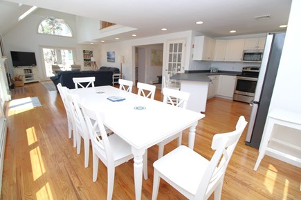 Wellfleet Cape Cod vacation rental - Dining with family room and kitchen in background