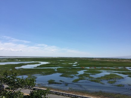 West End of Provincetown Cape Cod vacation rental - Kayakers following the channel through our marsh