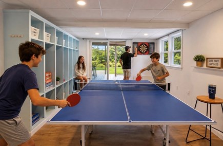 Falmouth Cape Cod vacation rental - Game room with ping pong, darts and a ton of board games