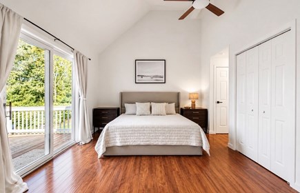 Falmouth Cape Cod vacation rental - Primary bedroom with porch access, 3 closets, full private bath