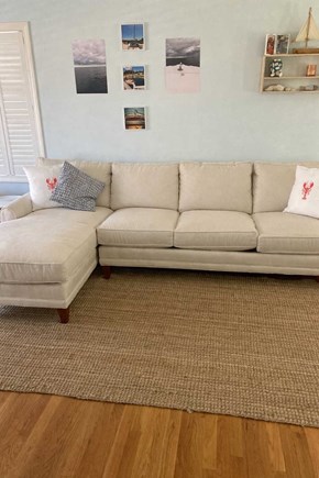 West Dennis Cape Cod vacation rental - Secondary living space with mounted tv and games for family fun.