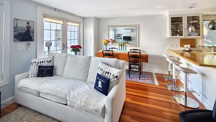 Wellfleet Cape Cod vacation rental - Living room with comfortable seating and dining area beyond