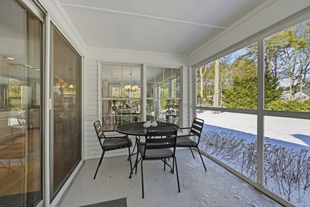Chatham Cape Cod vacation rental - Screened porch with dining area