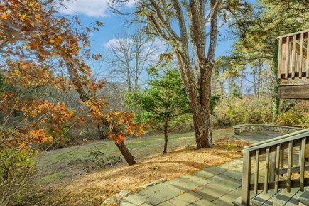 Chatham Cape Cod vacation rental - A serene outdoor space surrounded by lush greenery