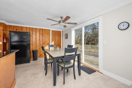 Harwich Cape Cod vacation rental - Dining area with view of the deck