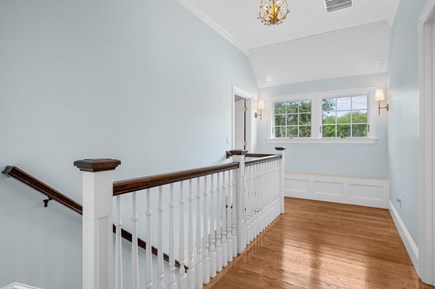Harwich Port Cape Cod vacation rental - Hallway to upper level bedrooms.