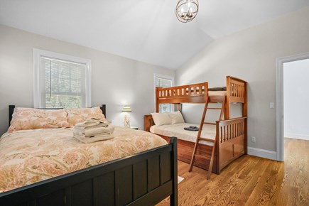 Harwich Port Cape Cod vacation rental - Bedroom #3 with two total Full sized beds and additional Twin sized bed on top bunk.