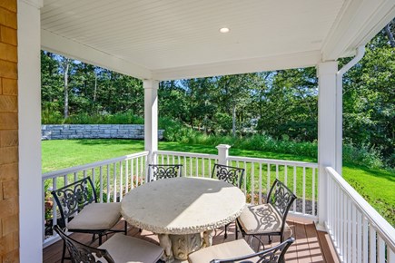 Harwich Port Cape Cod vacation rental - Dining table to the right of formal front door entry