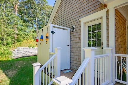 Harwich Port Cape Cod vacation rental - Enclosed outdoor shower off of kitchen entrance.