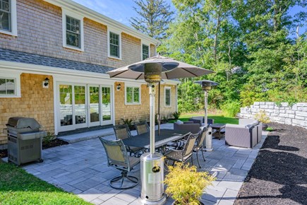 Harwich Port Cape Cod vacation rental - Outdoor entertaining area with two areas for gathering and a grill!