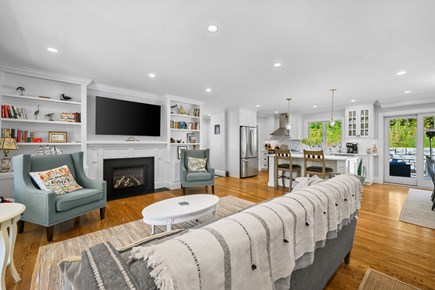 Harwich Port Cape Cod vacation rental - Open concept living with living area, kitchen and dining (to the right).