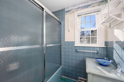 South Yarmouth Cape Cod vacation rental - Bathroom 1- Shared full shower and tub combination with bathroom 4- Main Level
