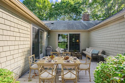 South Yarmouth Cape Cod vacation rental - Deck with outdoor dining table