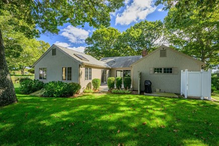 South Yarmouth Cape Cod vacation rental - Backyard with a view of the deck