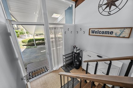 Sandwich Cape Cod vacation rental - Entryway to home leading up to the upper level of the home