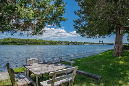 Bourne, Buzzards Bay Cape Cod vacation rental - Outside table with view of Buttermilk Bay