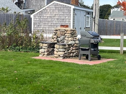 Falmouth Cape Cod vacation rental - Side yard with grill