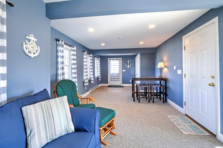Sandwich Cape Cod vacation rental - Entry way into open concept living room with sectional for family gatherings.