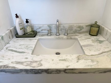 Dennis Village Cape Cod vacation rental - Newly renovated half bathroom in the primary w/ quartzite counter