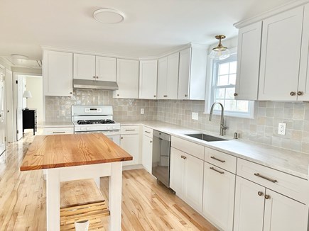 Dennis Village Cape Cod vacation rental - Newly renovated kitchen with Quartzite countertops and gas range