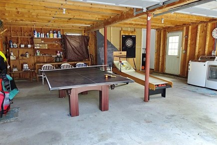 West Dennis Cape Cod vacation rental - Garage game and laundry area