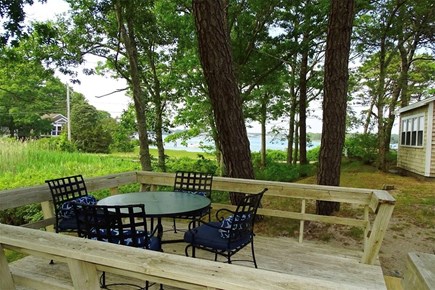 West Dennis Cape Cod vacation rental - Dining area over looking marsh area adjacent to house