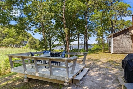 West Dennis Cape Cod vacation rental - Dining area over looking marsh area adjacent to house