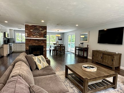 West Barnstable Cape Cod vacation rental - Living, kitchen & dining areas, 2 sliding doors for deck access