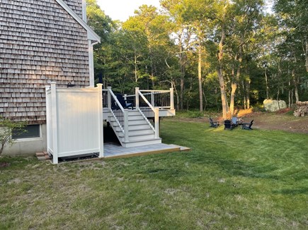 Brewster, MA Cape Cod vacation rental - Outdoor shower, deck, and firepit