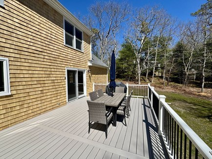 Brewster, MA Cape Cod vacation rental - Large deck with gas grill, table for 6 and umbrella
