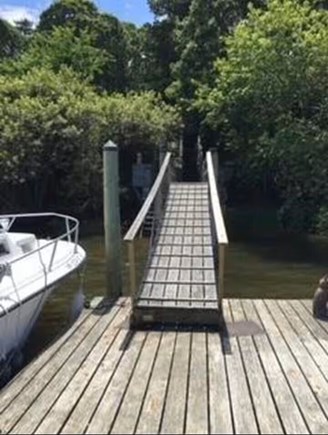 South Yarmouth Cape Cod vacation rental - Dock in Follin's Pond allows for ocean access.