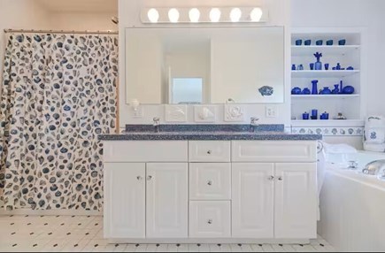South Yarmouth Cape Cod vacation rental - Master bath boasts a shower and jacuzzi.