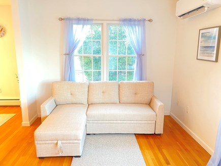 South Yarmouth Cape Cod vacation rental - Pullout couch in living room for additional sleeping arrangement.