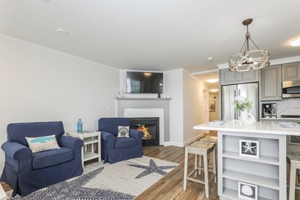 Dennis Port Cape Cod vacation rental - Open concept Kitchen living area, flat scene tv and gGas fire place - 405 Old Wharf Road-Dennisport Cape Cod- New England Vacation Rentals