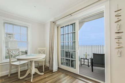 Dennis Port Cape Cod vacation rental - Bistro table and sliders to balcony overlooking the Ocean - 405 Old Wharf Road-Dennisport Cape Cod- New England Vacation Rentals
